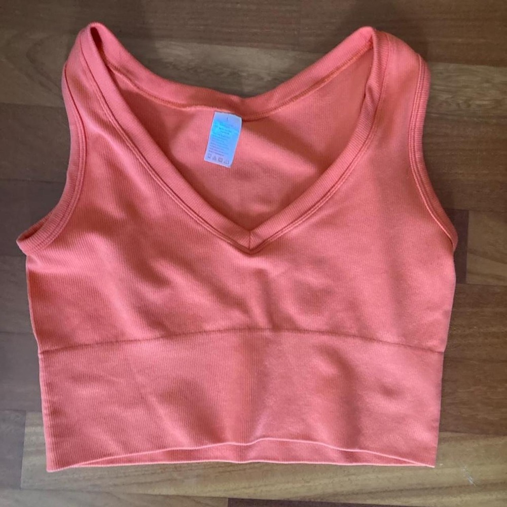 Bright Orange snug crop tank top in size L dance workout